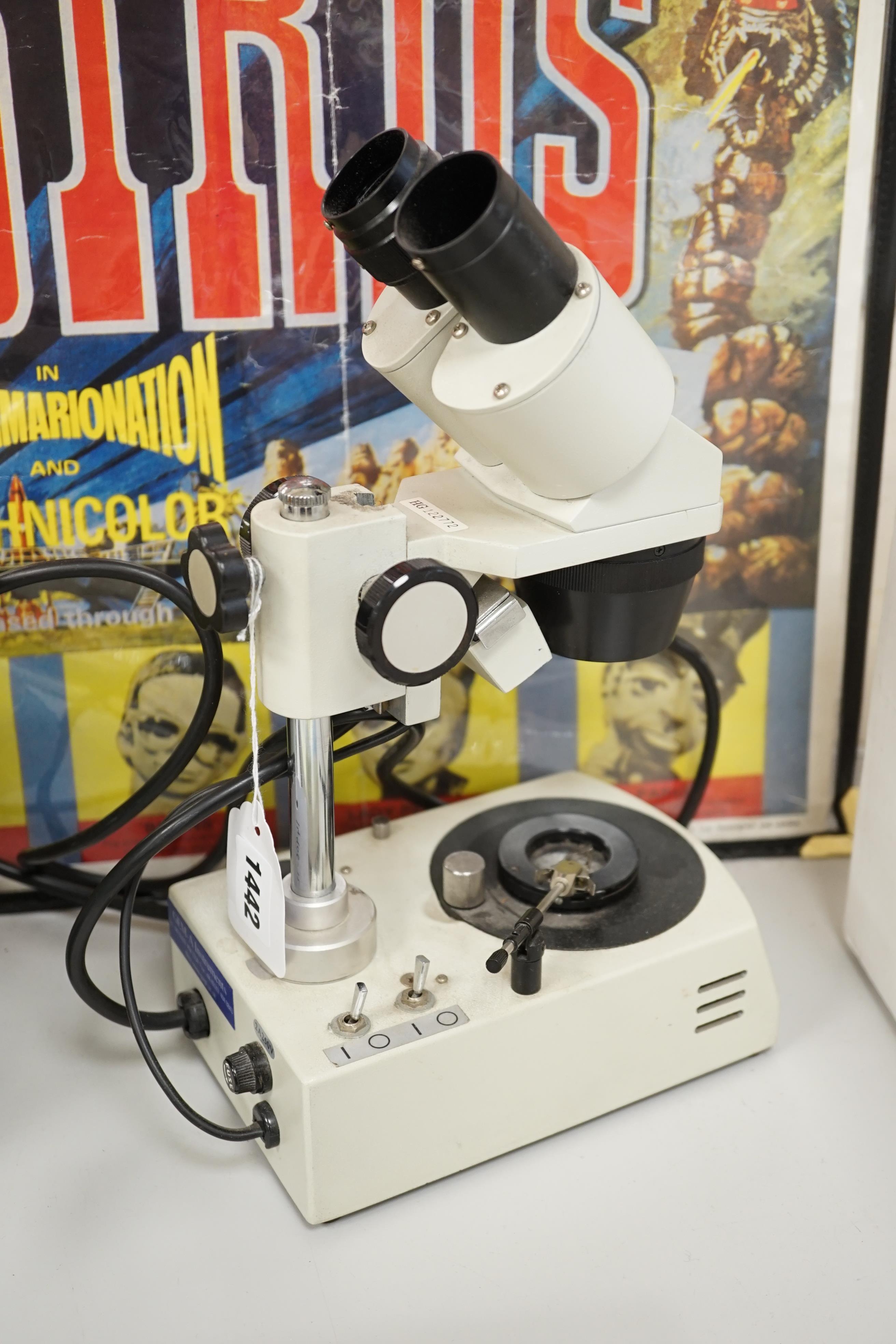 A Gem A Instruments binocular microscope, 31cm high. Condition - fair with some wear and possible parts missing.